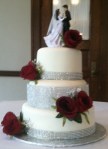 Wedding Cake with Bling and Burg. Flowers